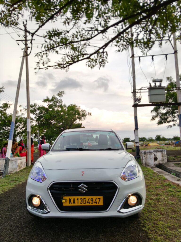 High-quality, clean car seat and interior used for taxi service in Hubli.