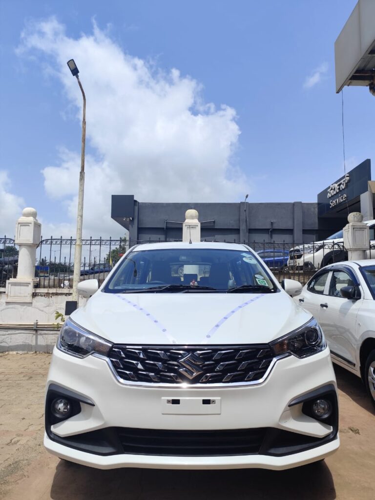 Large passenger bus for wedding or corporate travel in Hubli.